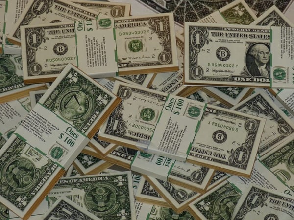 abundance of cash bills