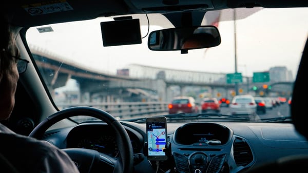 uber driver in car in traffic