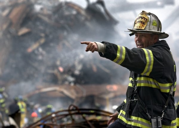 fire fighter wearing hat in natural disater