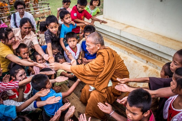 monk-surrounded-by-children-shrunken-image