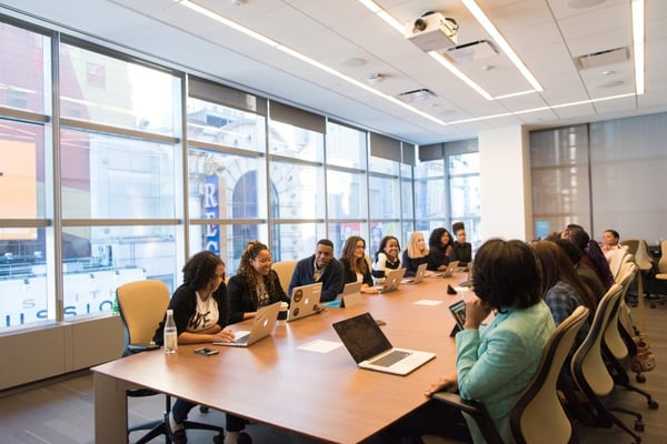 partners within office talking
