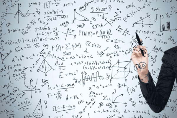 Womans hand is pointing out the complicated math calculations